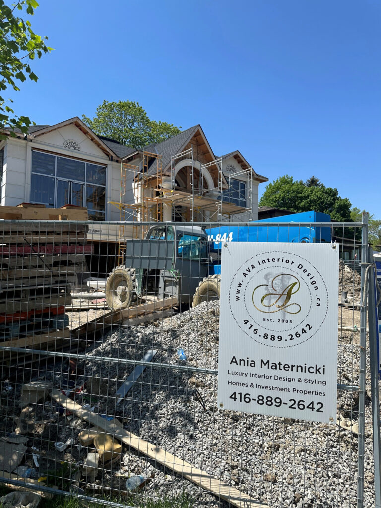 AVA Interior Design sign in front of New Build
